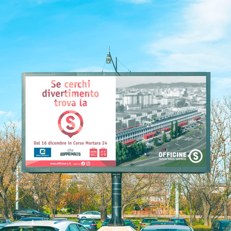 Billboard per strada con una pubblicità di Officine S