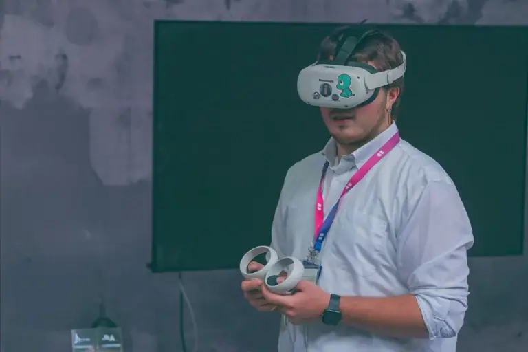 VR user in dark room, ready to explore new worlds.