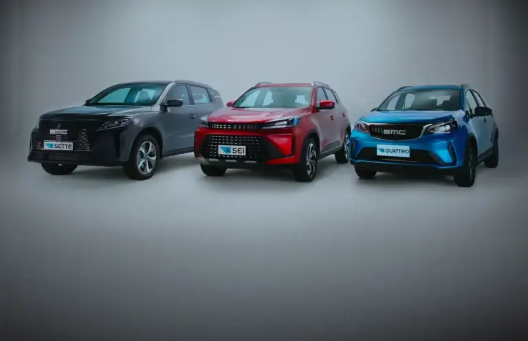 Three cars: gray SUV, red sedan, blue SUV, unique grilles.