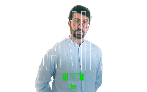 Man with dark hair, glasses, beard; DANIEL, Art Director text over image.